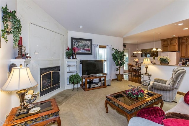 living room featuring vaulted ceiling and light colored carpet