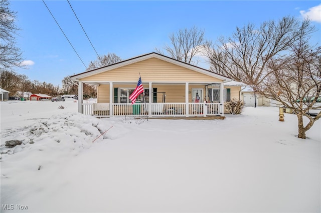 view of front of property featuring covered porch