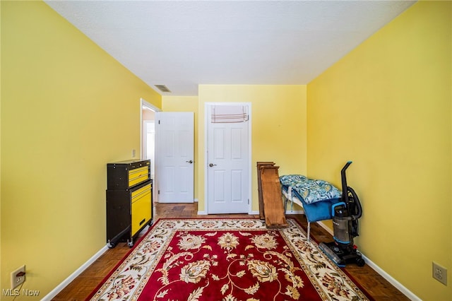 miscellaneous room featuring hardwood / wood-style flooring