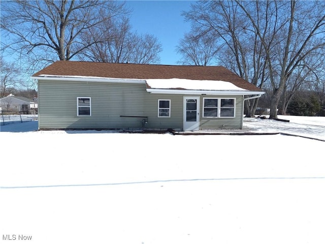 view of snow covered property