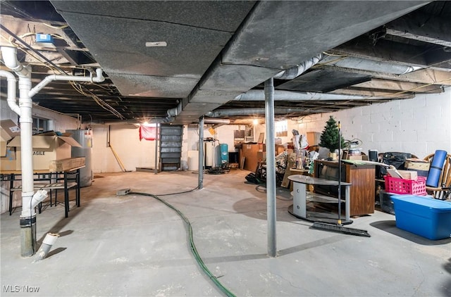 basement featuring water heater