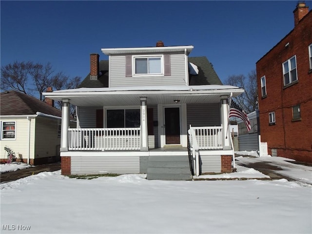 bungalow-style home featuring covered porch