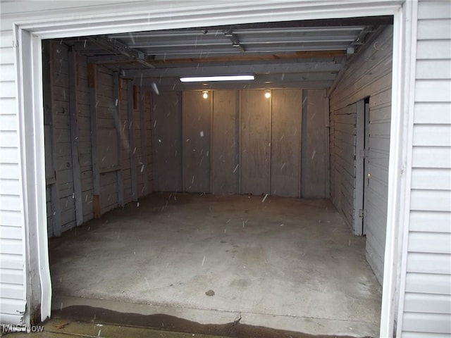 garage with wood walls