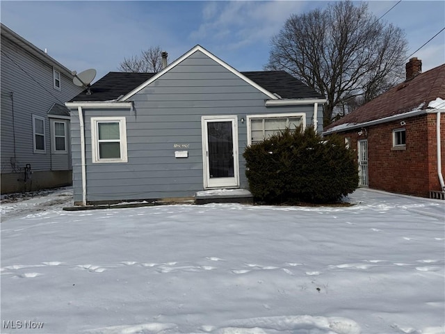 view of snow covered property