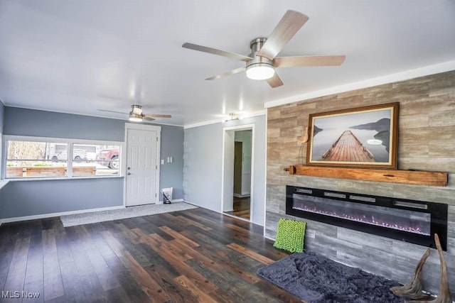 unfurnished living room featuring a tile fireplace, dark hardwood / wood-style floors, and ceiling fan