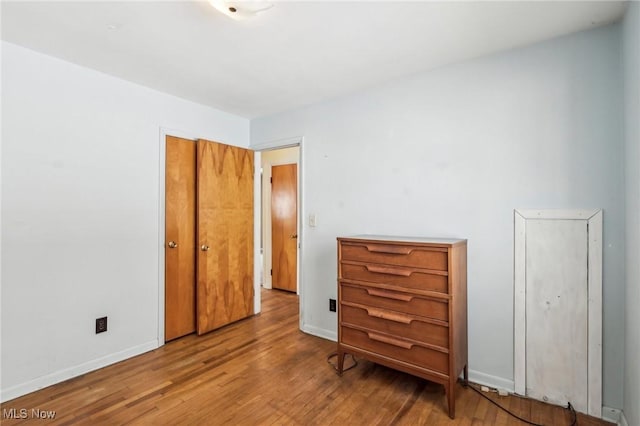 bedroom with light wood-type flooring