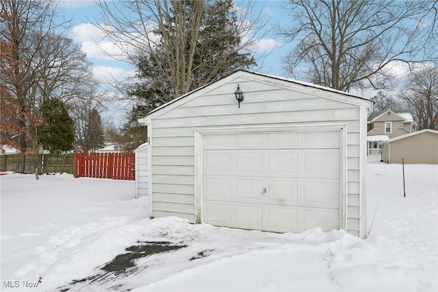 view of snow covered garage