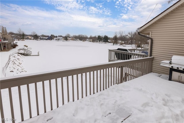 view of snow covered deck