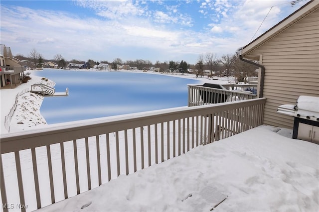 view of snow covered deck