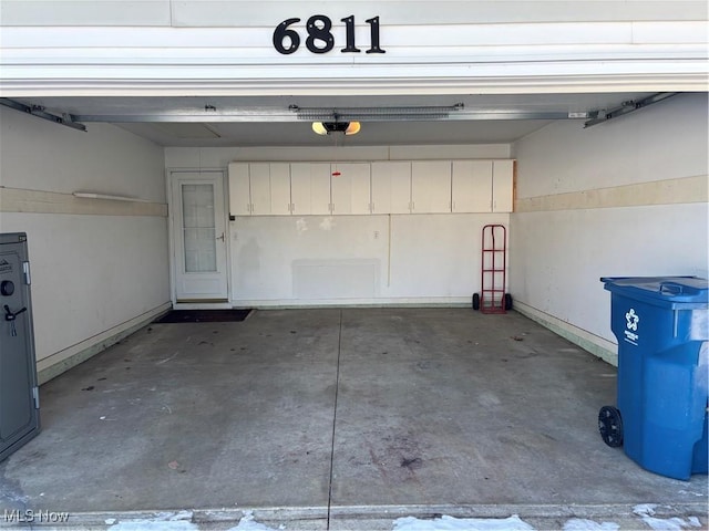 garage featuring a garage door opener