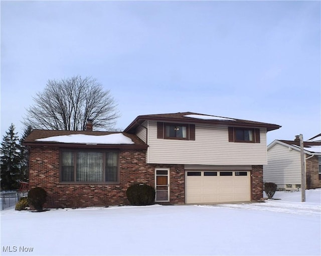 split level home featuring a garage