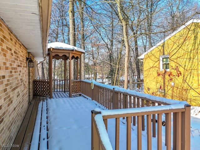 view of snow covered deck