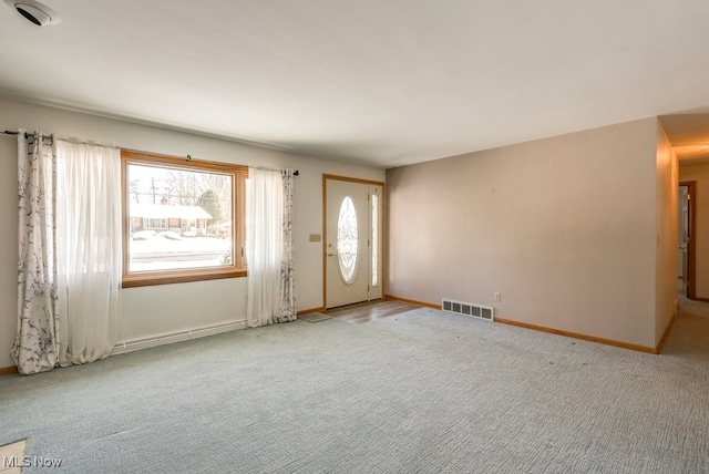 interior space featuring light colored carpet