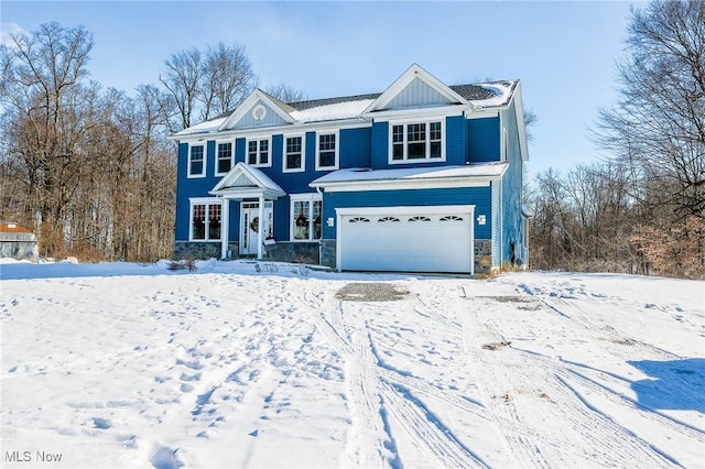 view of front of property featuring a garage