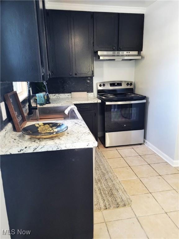 kitchen with sink, stainless steel range with electric cooktop, and light tile patterned flooring