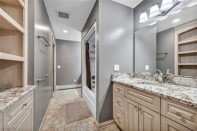 bathroom featuring vanity, a baseboard radiator, and a shower