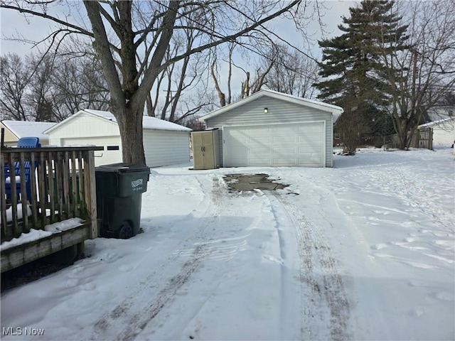 view of snow covered garage