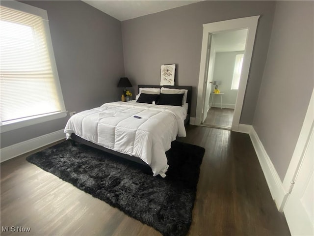 bedroom featuring dark hardwood / wood-style floors