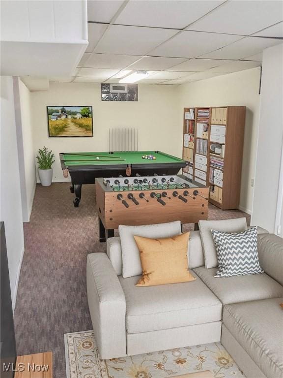 game room with billiards, radiator, and carpet