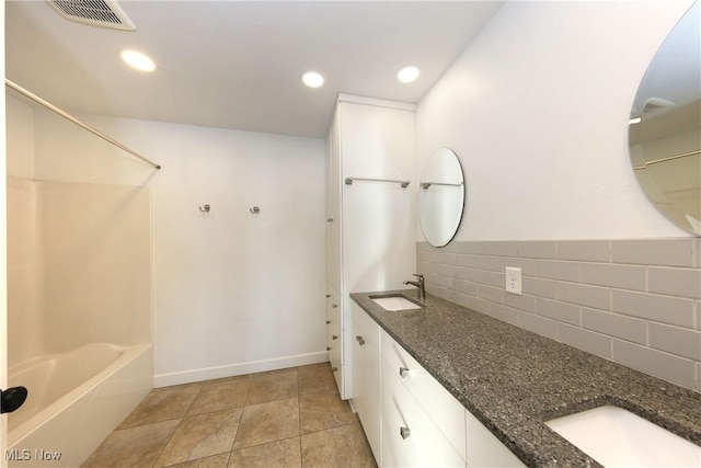 bathroom featuring vanity and tile patterned flooring