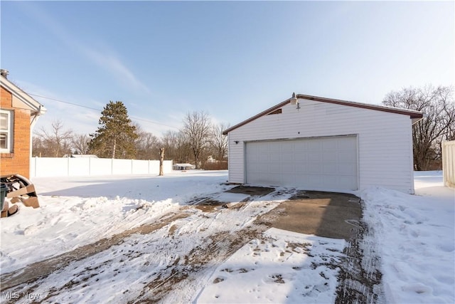 view of snow covered garage