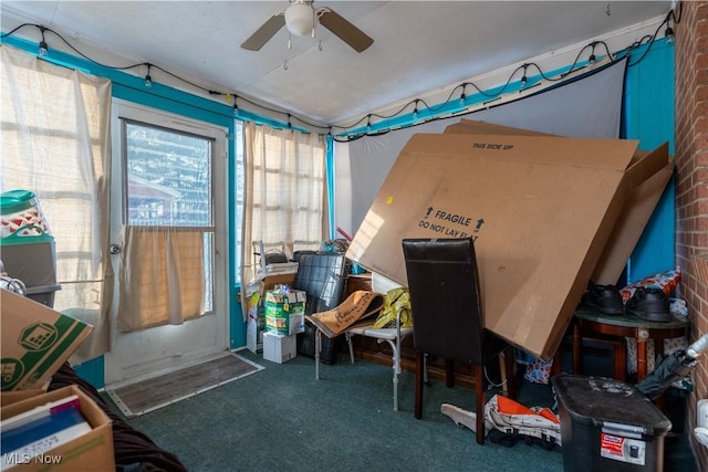 miscellaneous room with ceiling fan and carpet flooring