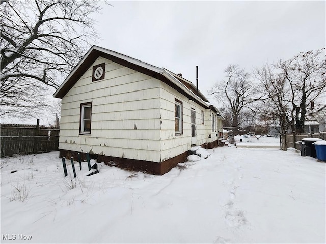 view of snow covered property