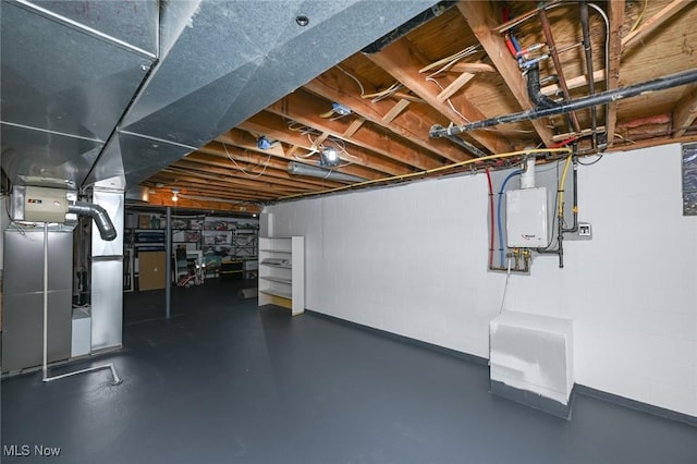 basement featuring tankless water heater