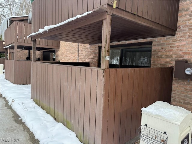 view of snow covered property