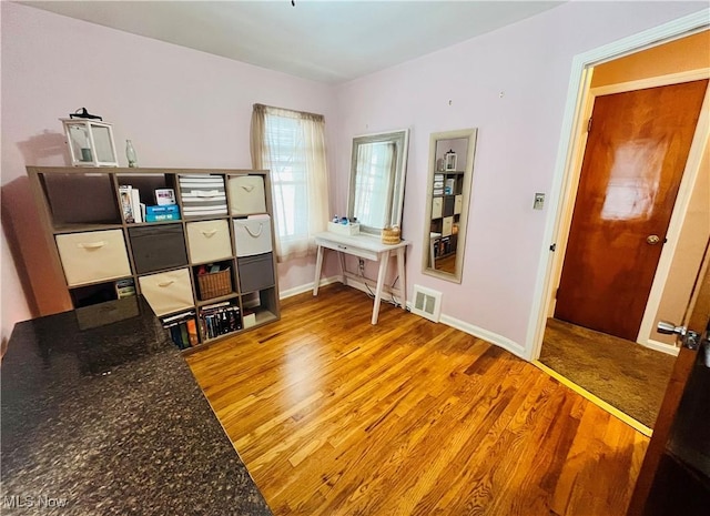 office area with hardwood / wood-style flooring