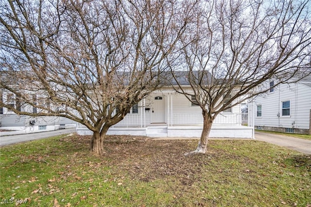 view of front of home with a front yard