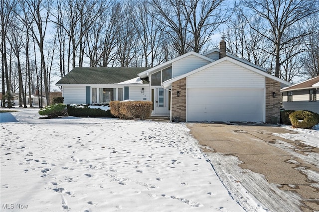 single story home featuring a garage