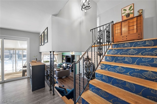 stairs with hardwood / wood-style flooring