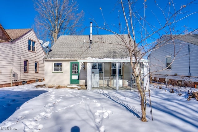 view of snow covered property