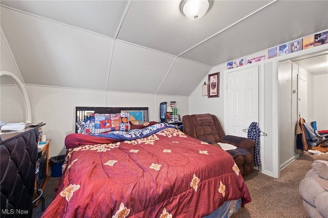 carpeted bedroom with lofted ceiling