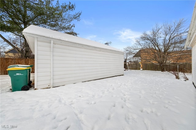 view of snow covered garage