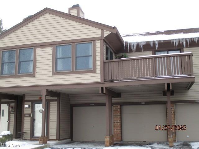 exterior space featuring a garage