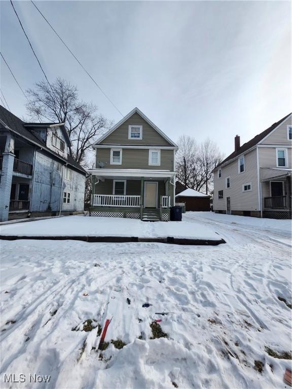 view of snow covered property