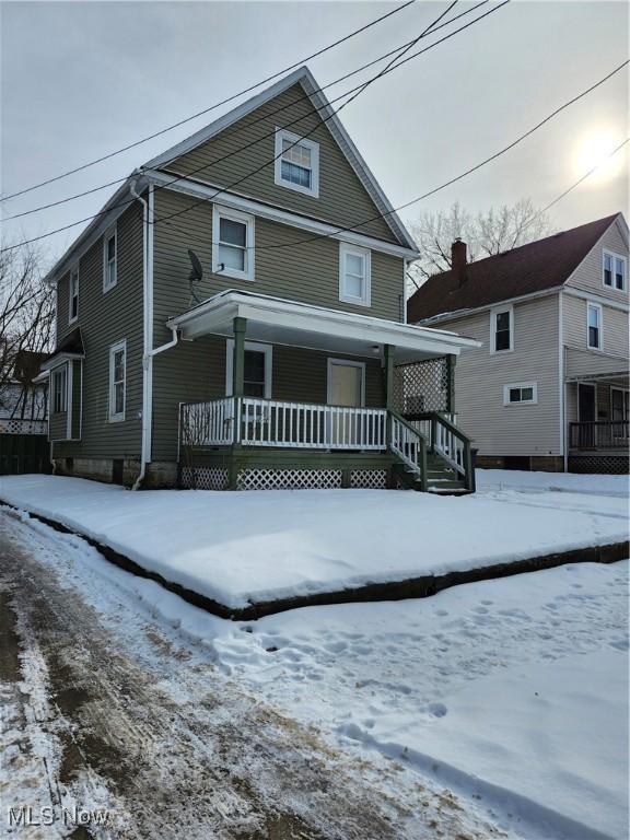 front of property featuring covered porch