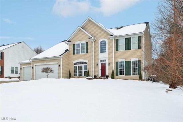 view of front of home with a garage