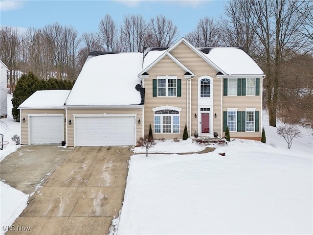 view of front of home with a garage