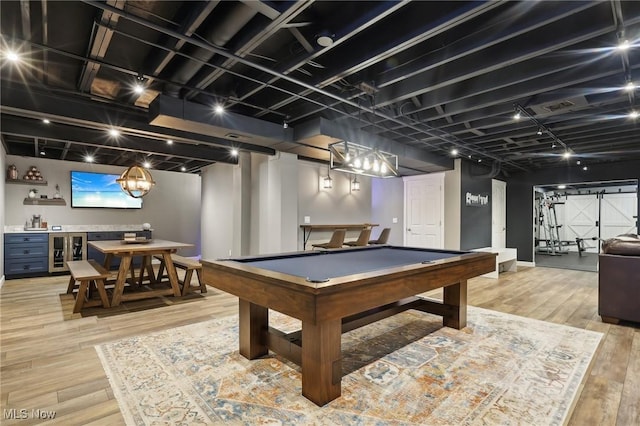 game room featuring wine cooler, indoor bar, wood-type flooring, and pool table