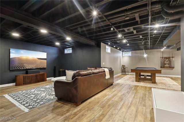 home theater with hardwood / wood-style floors and billiards