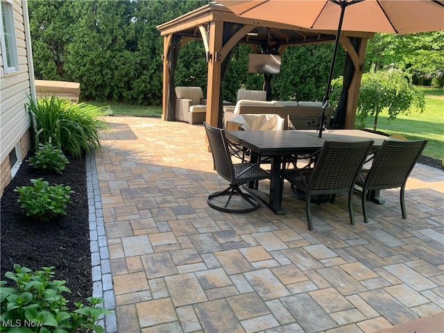 view of patio featuring a gazebo and an outdoor hangout area