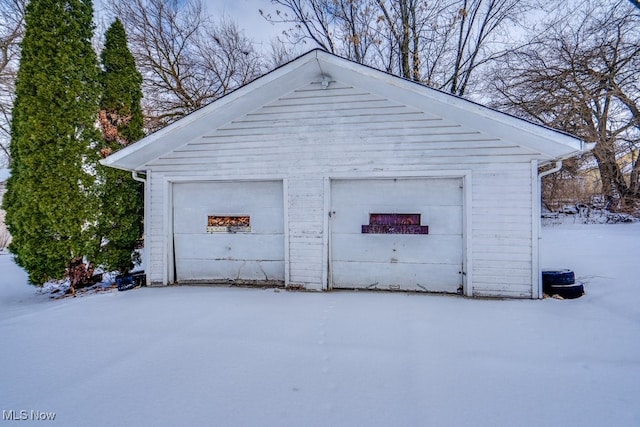 view of snow covered garage