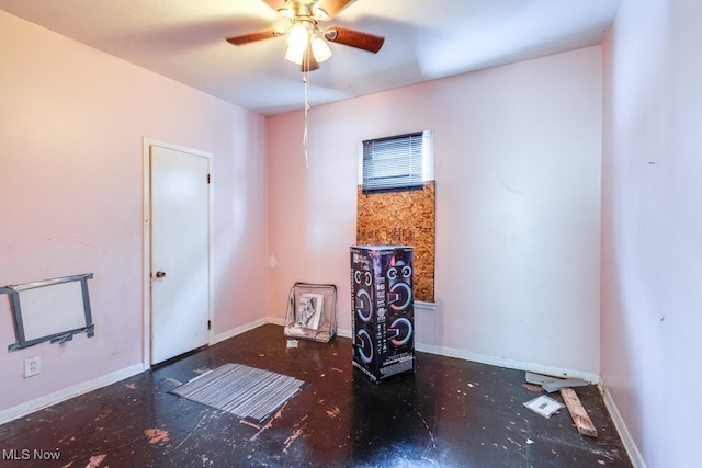 spare room with ceiling fan