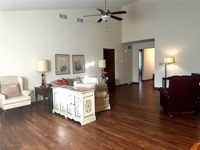 living room with high vaulted ceiling, dark hardwood / wood-style floors, and ceiling fan