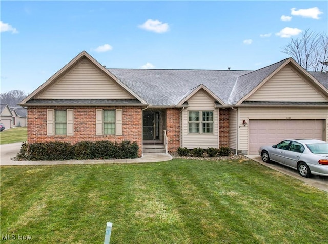 single story home featuring a garage and a front yard