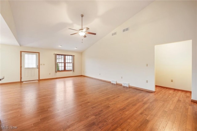 1089 Park Pl, Niles, OH 44446 - unfurnished room featuring ceiling fan, high vaulted ceiling, and light wood-type flooring