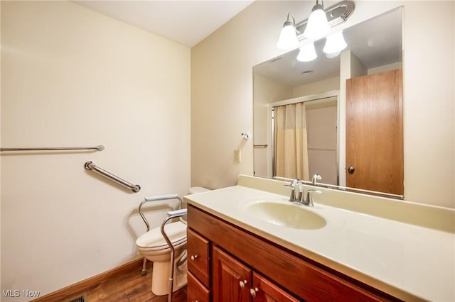 1089 Park Pl, Niles, OH 44446 - bathroom featuring hardwood / wood-style flooring, vanity, curtained shower, and toilet